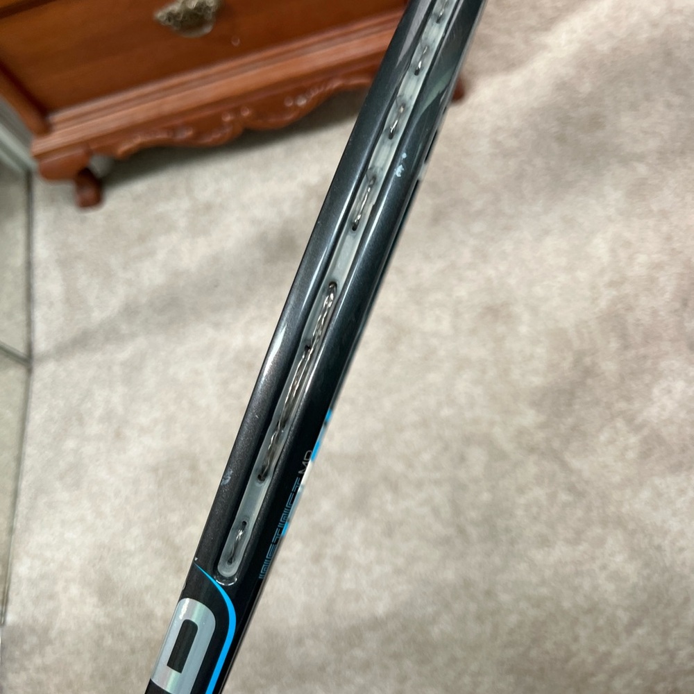 Used Head tennis racket- $45- has scratches